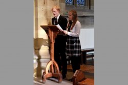 [476] Vincent Jones and Emily Robinson read Old Augustinians WW1 roll call before the two minutes silence